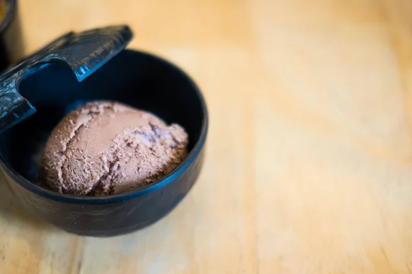 Delicious Fresh Grated Chocolate Black Bowl Close — Zdjęcie stockowe
