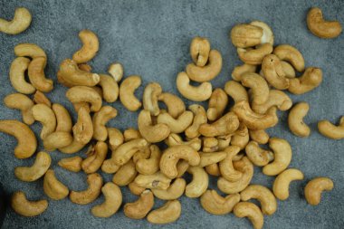 Whole tasty roasted cashew nuts. Top view