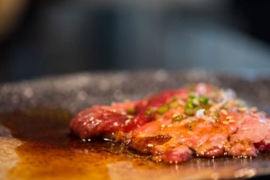 Fresh premium Japanese beef meat with sauce.