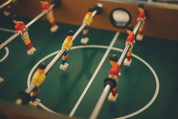 Close up of plastic table football game, table soccer. Sport in home concept