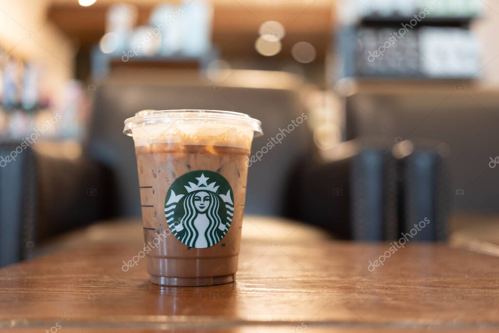 Samut Prakan, Thailand - October 23, 2022 : Starbucks cold mocha drink in plastic cup in Starbucks shop. Famous coffee brand franchise originated in USA