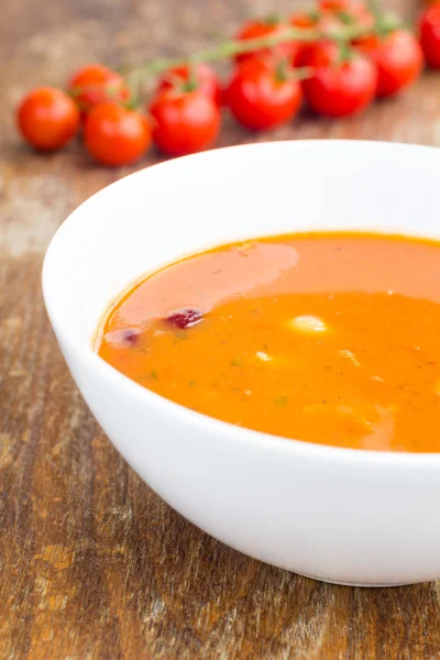 Plate of minestrone soup with cherry tomato — Stock Photo, Image