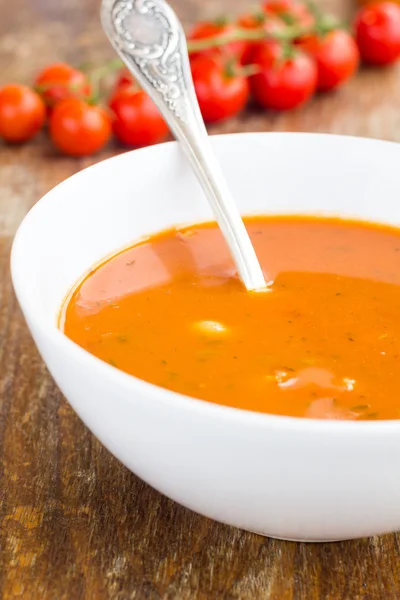 Plate of minestrone soup with cherry tomato — Stock Photo, Image