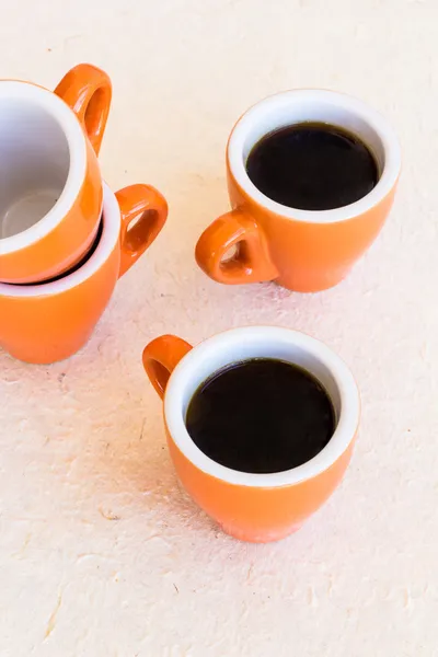 Composição de quatro copos de café modernos — Fotografia de Stock