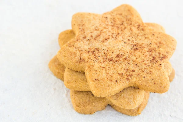 Star-shaped shugar cookies close-up on a white background — Stock Photo, Image