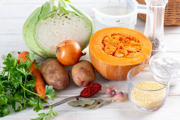 Ingredients for cooking soup with pumpkin and vegetables. Step by step, recipe. Healthy food, food for children.