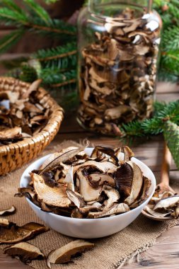 Dried mushrooms on a rustic wooden table
