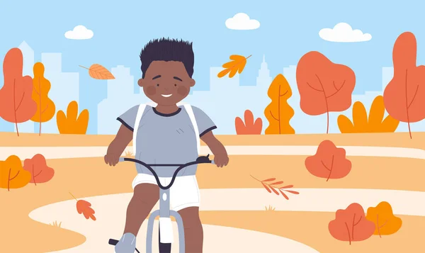 在秋天城市公园的路上骑自行车的学龄前儿童，骑自行车的男孩 — 图库矢量图片