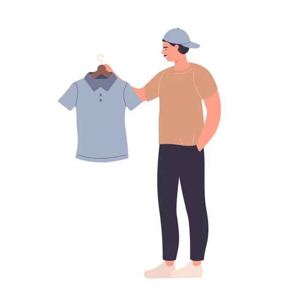 Standing cool man in sportive clothes buying new t shirt — Stock Vector