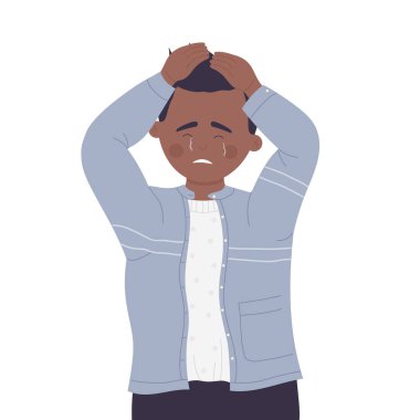 Ağlayan çocuk başını tutuyor.