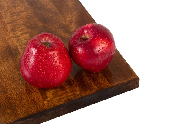 Fresh juicy water-sprinkled apples on white background — Stock Photo, Image