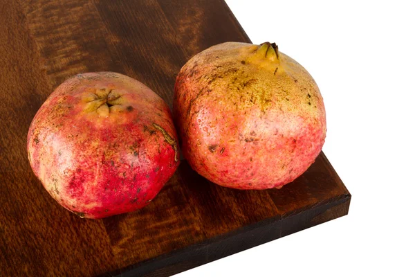 Fresh juicy ripe pomegranate on white background — Stock Photo, Image