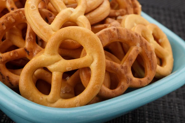 Pretzels in a blue plate — Stock Photo, Image