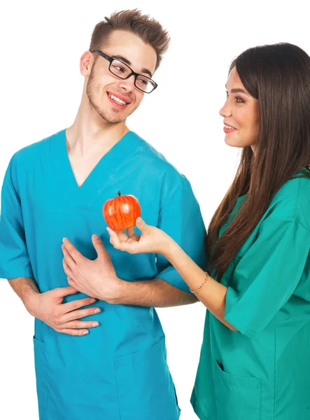 Médecins avec une pomme — Photo