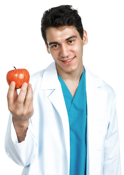 Doctor con una manzana — Foto de Stock