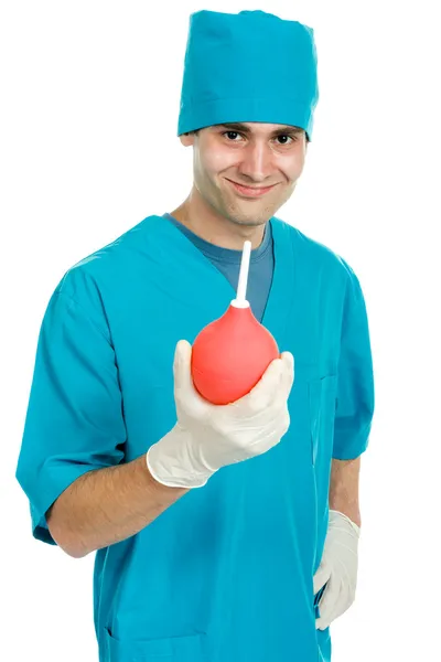 Médico com uma seringa de enema Imagem De Stock