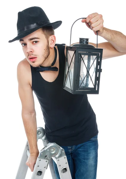 Man with a lamp — Stock Photo, Image