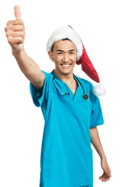 医科学生在圣诞老人的帽子 — 图库照片