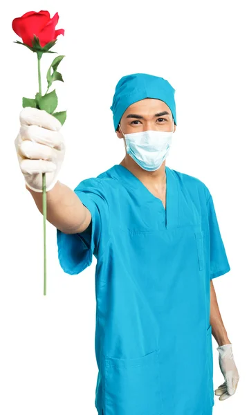 Medical student with a rose — Stock Photo, Image