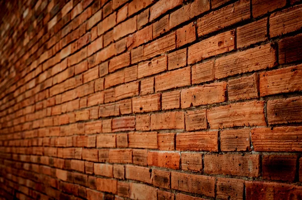 Perspectief van oude bakstenen muur — Stockfoto