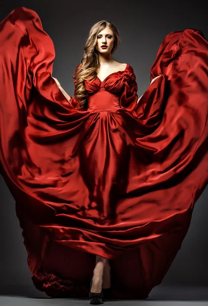 Frau im roten Kleid lizenzfreie Stockbilder