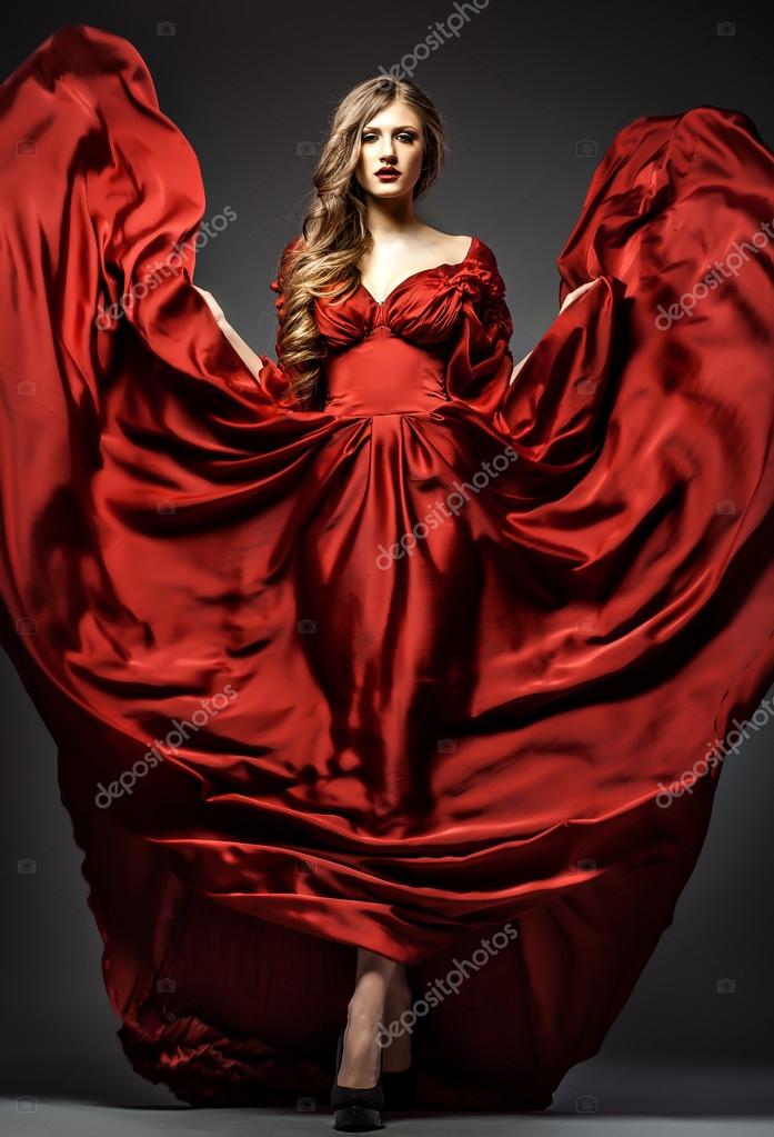 Woman in red dress — Stock Photo © mochak #47497011
