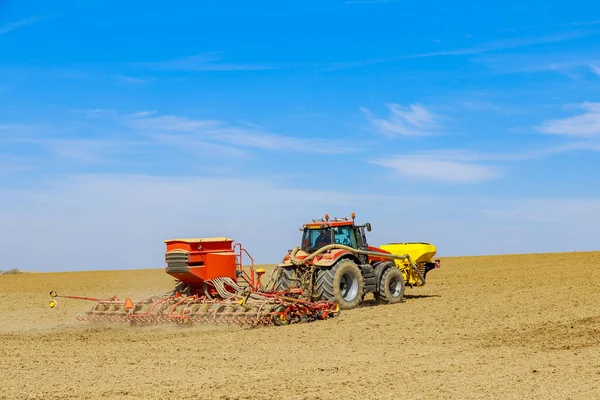 Drill Attached Tractor Sows Field Grain Modern Technology Works Field — стоковое фото