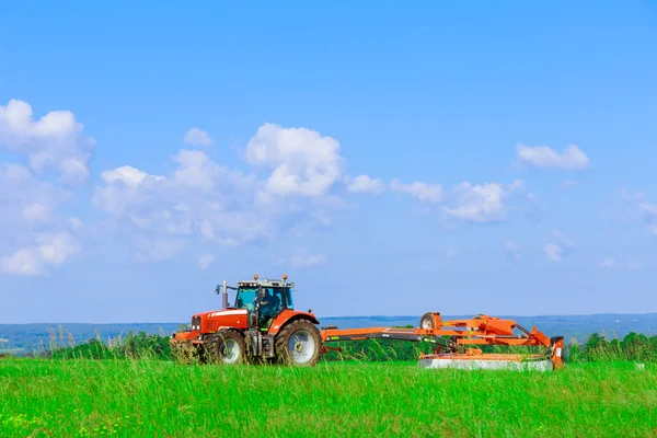 Rotary Mower Attached Tractor Moving Field While Mowing Fresh Green — Stok fotoğraf