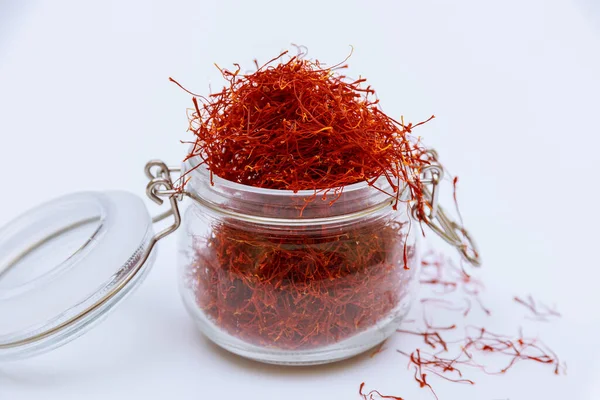 Glass Jar Filled Saffron Stamens White Background Dry Red Spice — Foto de Stock