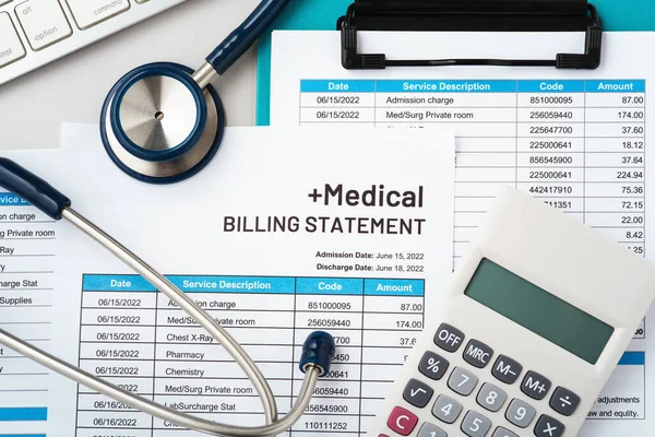 Medical billing statement with stethoscope and calculator, top view