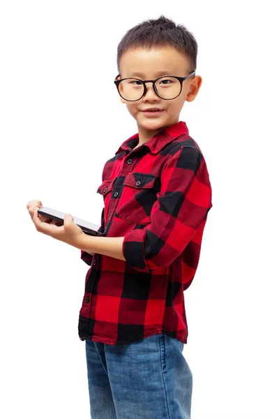 Smart Kid Holding Tablet Wearing Eyeglasses Looking Camera Isolated White — 图库照片