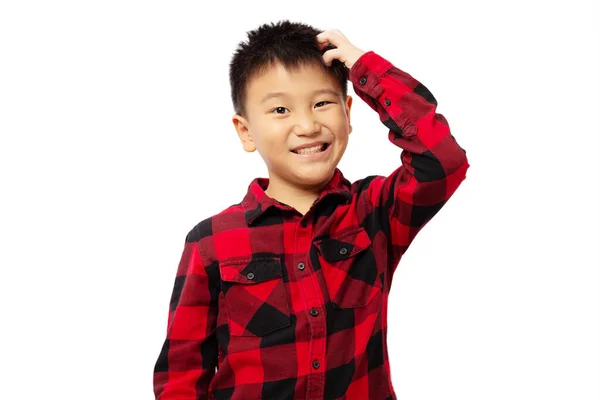 Confused Kid Scratching Head Wearing Red Shirt Isolated White Background — Zdjęcie stockowe
