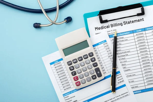 Calculator on medical billing statement with pen on blue background, top view with copy space