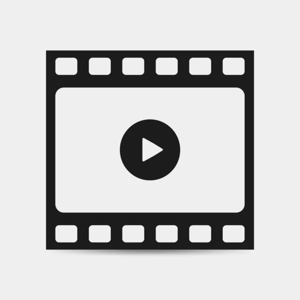 Speel video pictogram geïsoleerd op grijze achtergrond. Filmstrip met speelbord. Cinema tape icoon. Vector — Stockvector