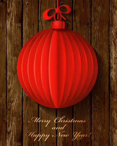 Red origami Christmas ball greeting card on wood background. — Stock Vector