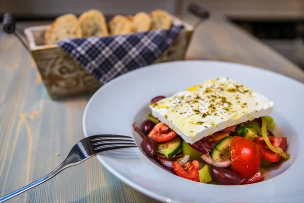 Salad with feta cheese tomato and cucumber — Stock Photo, Image