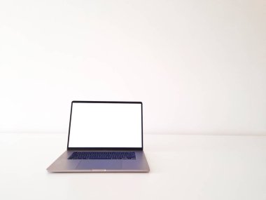 laptop on white table front view