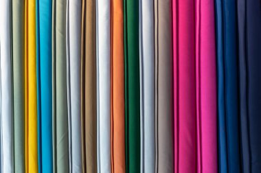 Stack of colorful fabric texture, close up