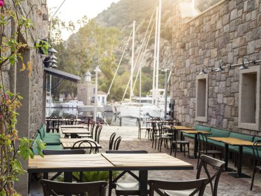 empty marble table in front of marina background, close up