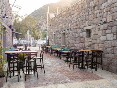 empty marble table in front of marina background, close up