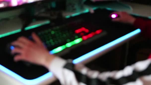 Teenager Playing Computer Games Illuminated Desktop Blurry Background Showing Esports — Stock Video