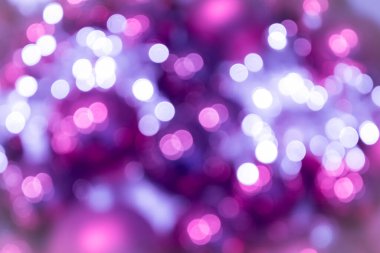 Şenlikli pembe gül ışıltılı bokeh Noel baloları arka planı, Noel için mükemmel arka plan olarak renkli noktalar gösteriyor, gümüşçüler, kutlamalar ve mutlu yeni yıl etkinlikleri ve güzel bulanık bir parti