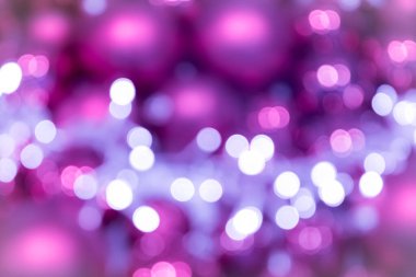 Şenlikli pembe gül ışıltılı bokeh Noel baloları arka planı, Noel için mükemmel arka plan olarak renkli noktalar gösteriyor, gümüşçüler, kutlamalar ve mutlu yeni yıl etkinlikleri ve güzel bulanık bir parti
