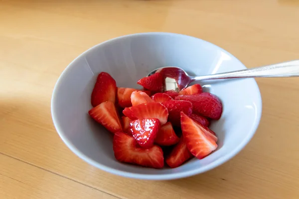 Many Cut Strawberries Bowl Ready Eat Silver Spoon Delicious Finger — Stock Photo, Image