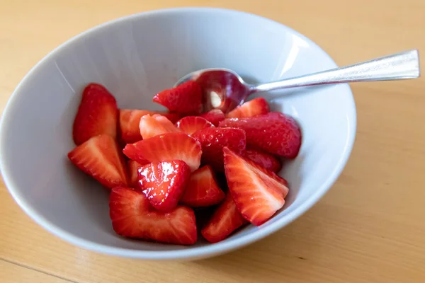 Many Cut Strawberries Bowl Ready Eat Silver Spoon Delicious Finger — Stock Photo, Image