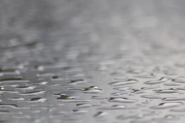 Many Raindrops Table Surface Rainy Day Show Pearls Water Abstract — Zdjęcie stockowe
