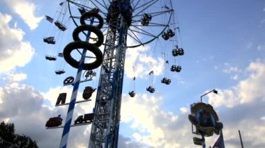 Dusseldorf, NRW, Germany - 07 14 2022: Bayern Tower free fall thrilling fun ride on the Dsseldorfer Rheinkirmes amusement park as big parish fair and kermis in Germany for fun and thrilling action