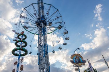 Dsseldorf, NRW, Germany - 07 14 2022: free fall tower Bayern Tower waiting for guests on the Dusseldorfer Rheinkirmes amusement park as big parish fair and kermis in Germany for fun adrenaline kick