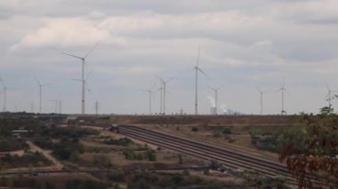 Neuss, Germany - 07 31 2022: Garzweiler brown coal and open pit mine for ignite shows natural disaster of surface mining and exploitation of fossil energy with heavy machinery like excavators diggers