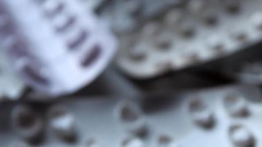 Many empty pill packages blisters of drug addicted people and drug abusing people as pharmaceutical painkiller and medical therapy overdose treatment for medical addicted people and dangerous overdose